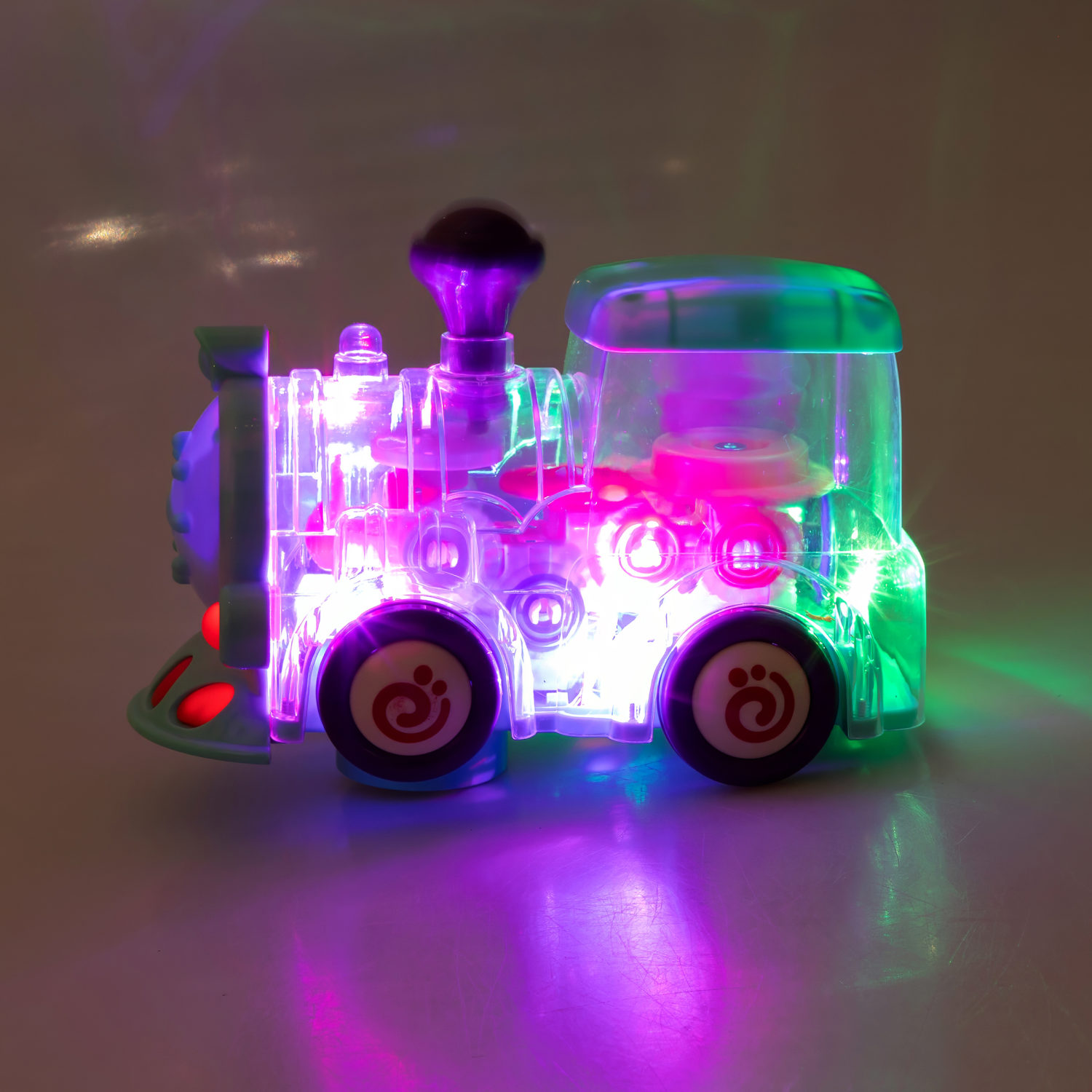 Игрушка прозрачная с шестеренками 1TOY Движок «Локомитив», со светом и звуком, 1 шт.